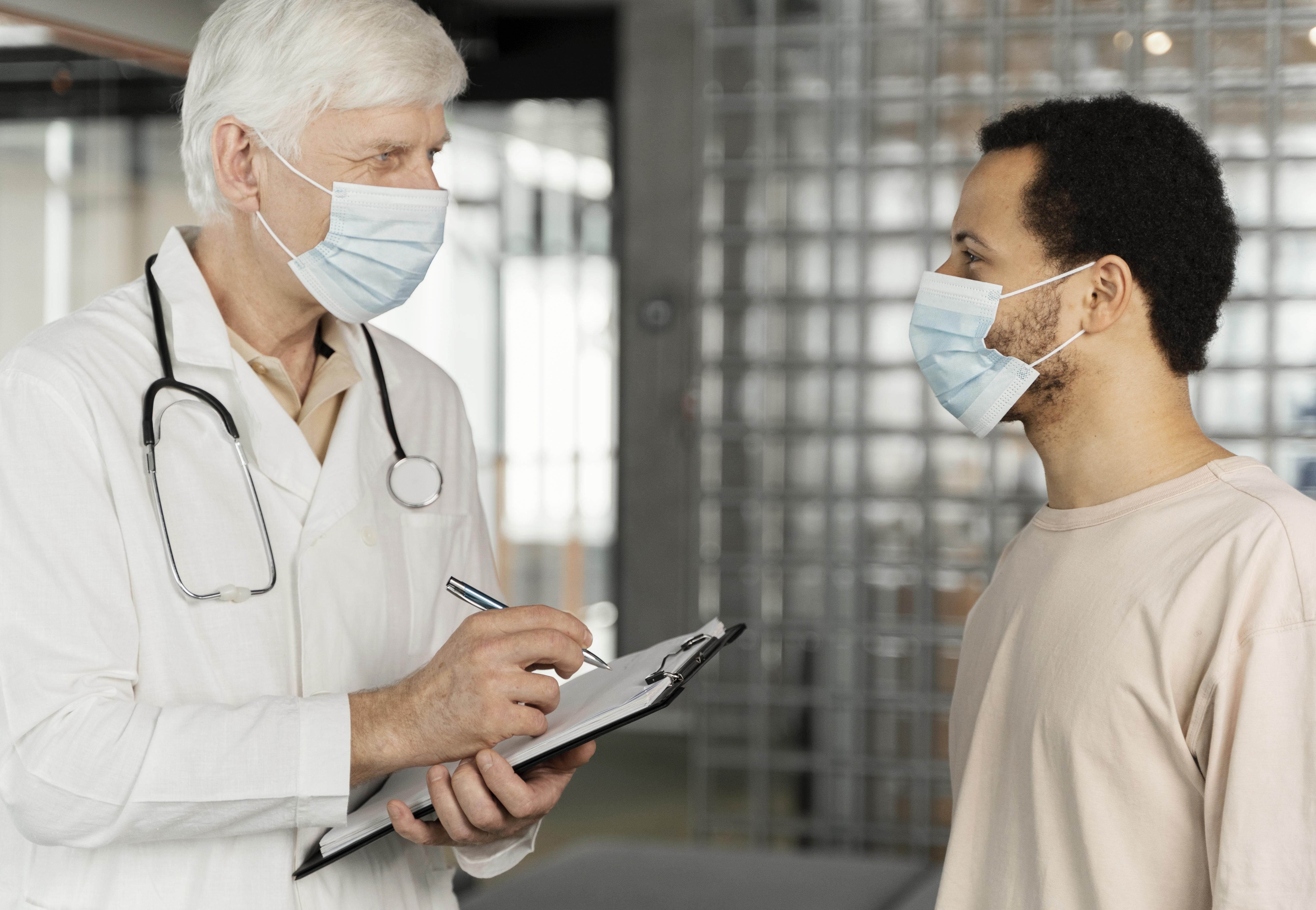 Licensed OnCure doctor conducting medical consultation at home in Dubai